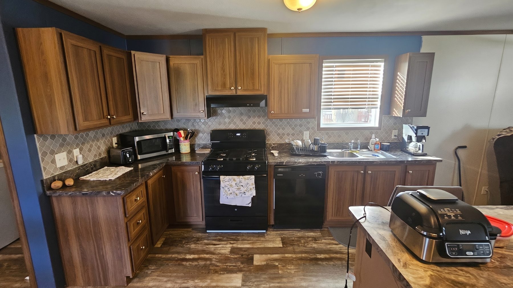 After: Kitchen repaint - Whitmore Lake — interior painting by Home Strategy LLC